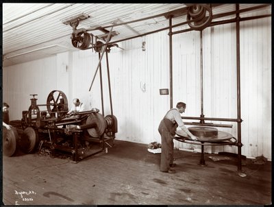 Interior View of Men Working on Leather at the New York Leather Belting Co., New York, 1906 by Byron Company
